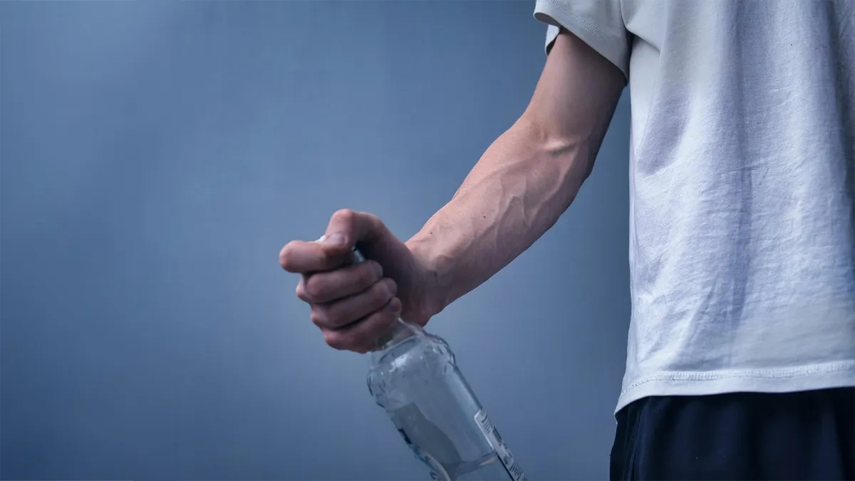 Man and bottle Alcohol theme