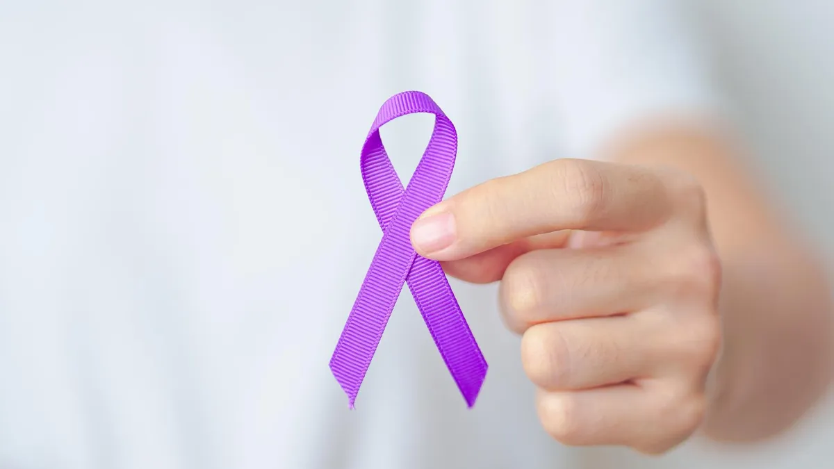 Purple Ribbon Held by Hand